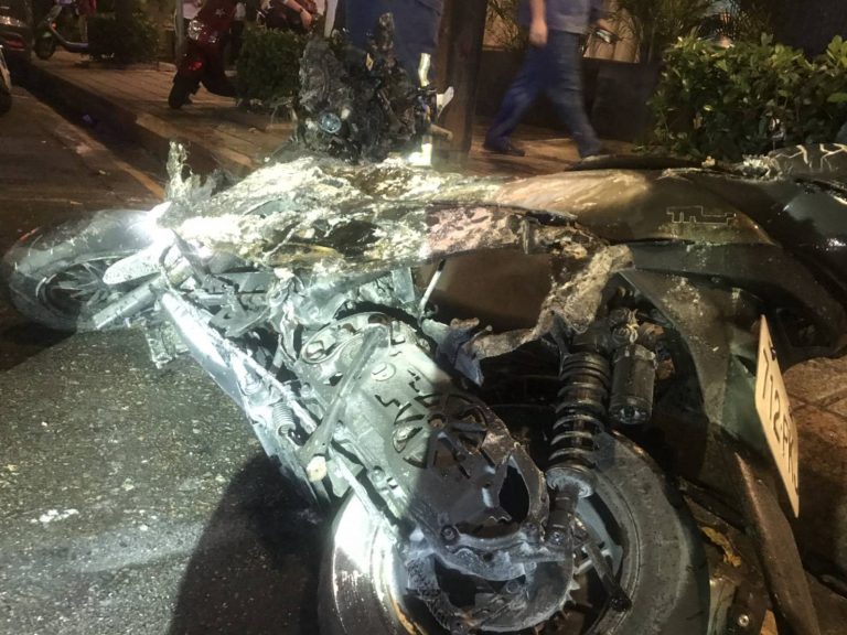 圖片說明：民生東路與林森北路發生一起交通事故，重型機車起火，駕駛已送往醫院急救昏迷不醒。(記者林艷林翻攝)