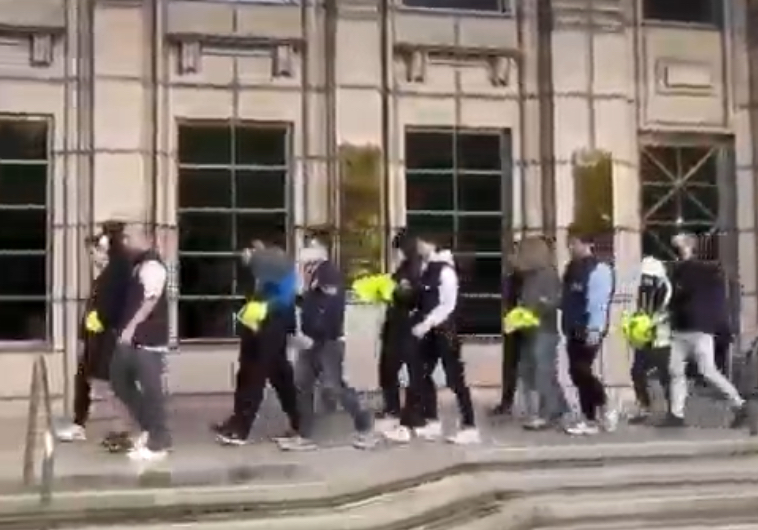 刑事局警方逮弘仁會詐團共12嫌。（記者徐煜勝翻攝）