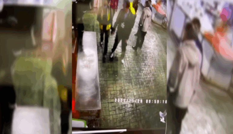 北市議員洪婉臻提供畫面指出市場處官員用腳踢攤商的生財工具。(洪婉臻辦公室提供)